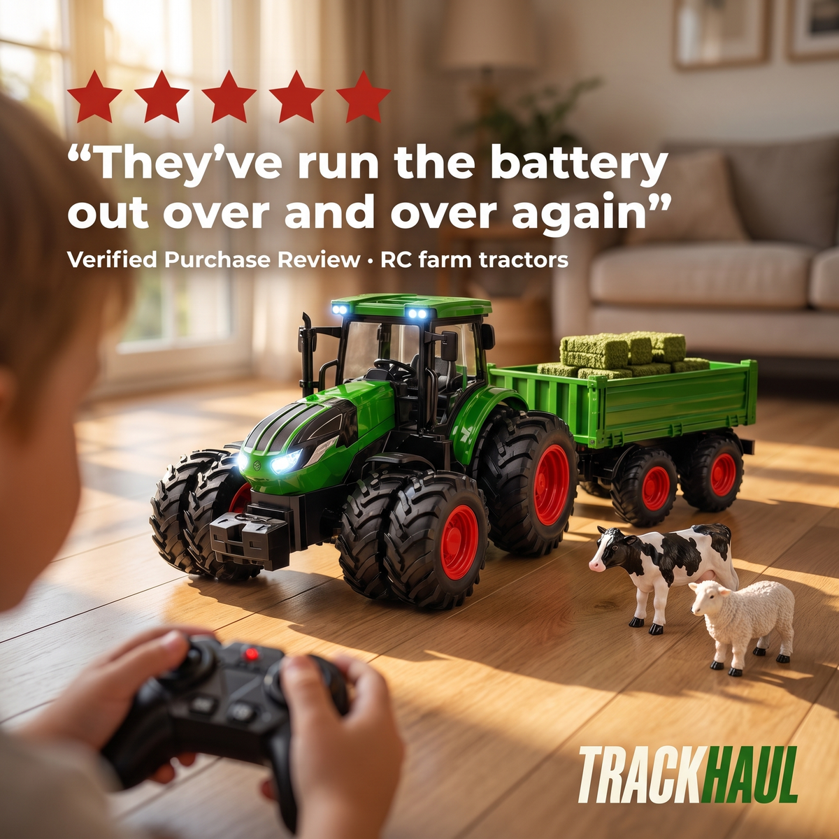 Child driving the TrackHaul tractor with the remote